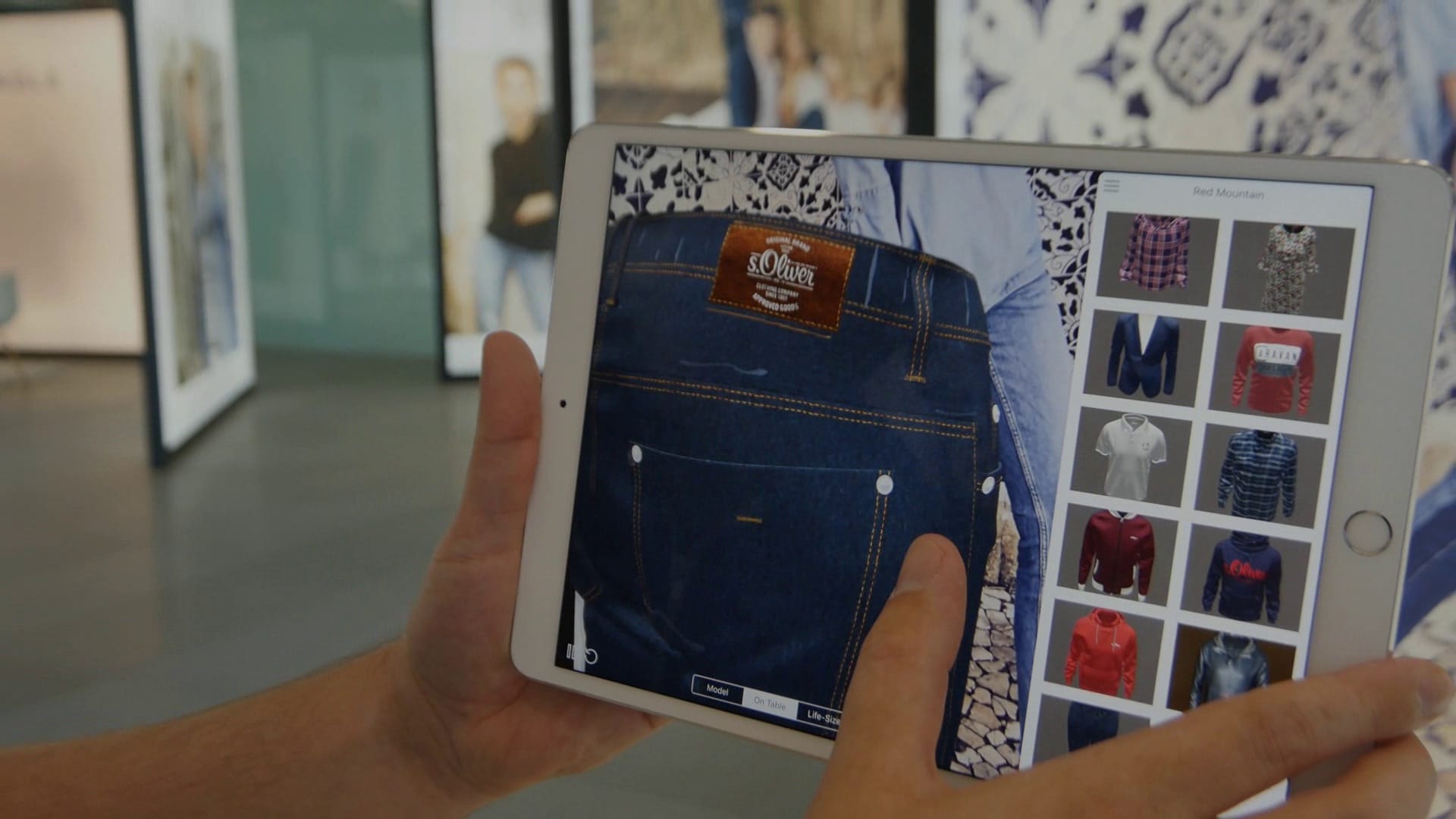 iPad-App mit Jeans-Detailansicht und s.Oliver Lederpatch – Kollektionsübersicht und Ansichtsmodi Model, On Table, Life-Size